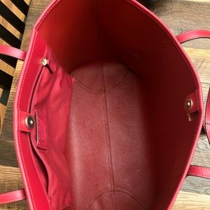 Gently used Coach tote. A few pen marks inside.